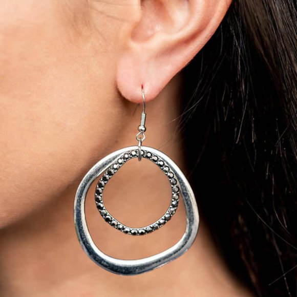 Spinning With Sass Silver Earrings